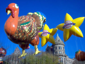 Turkey and star shape giant helium balloons used in parades.