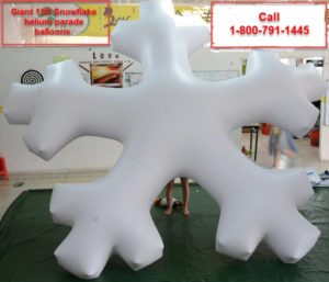 giant helium snowflake shape helium parade balloon